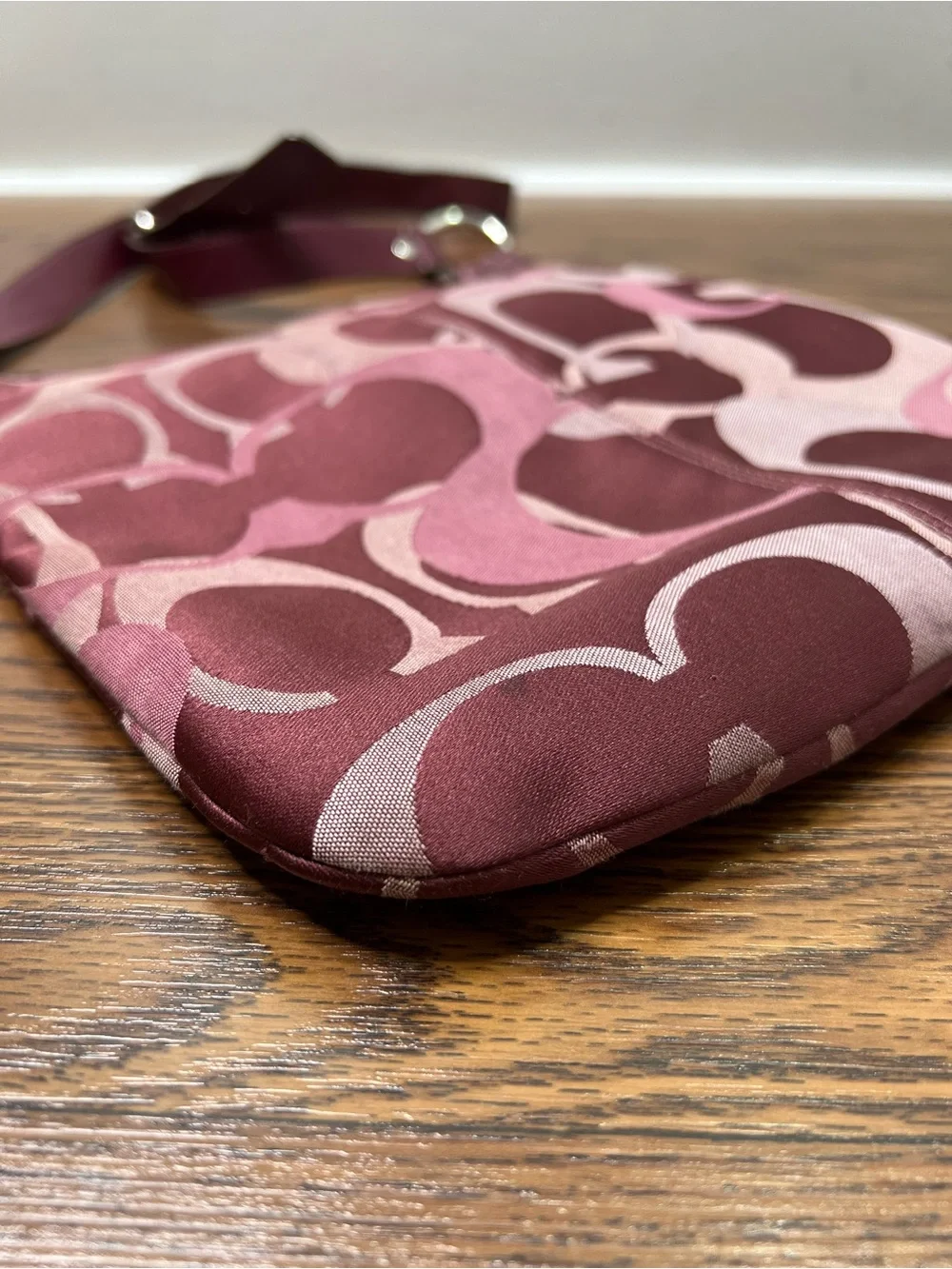 Coach Penelope Optic Signature Hippie Crossbody Bag in a purple/plum color